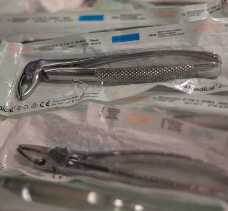 a bunch of surgical instruments are in plastic bags